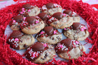 Chocolate Chip Cookies Dipped in Chocolate with Peanut Butter Chocolate heart on top